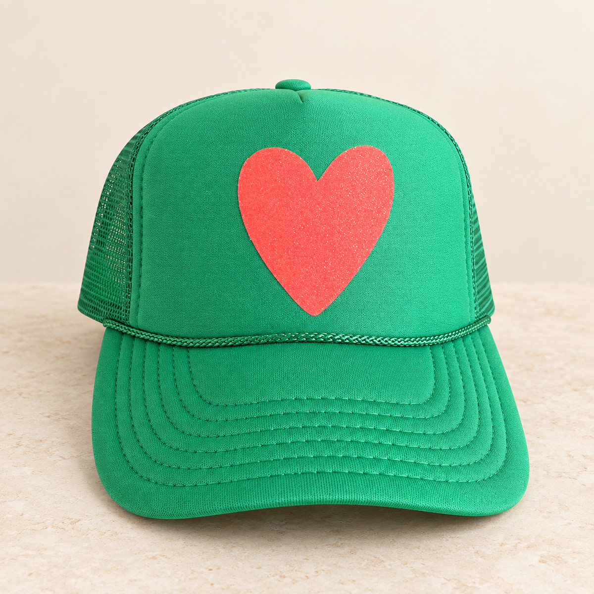 Heart grapefruit sparkle cactus trucker — studio product photo
