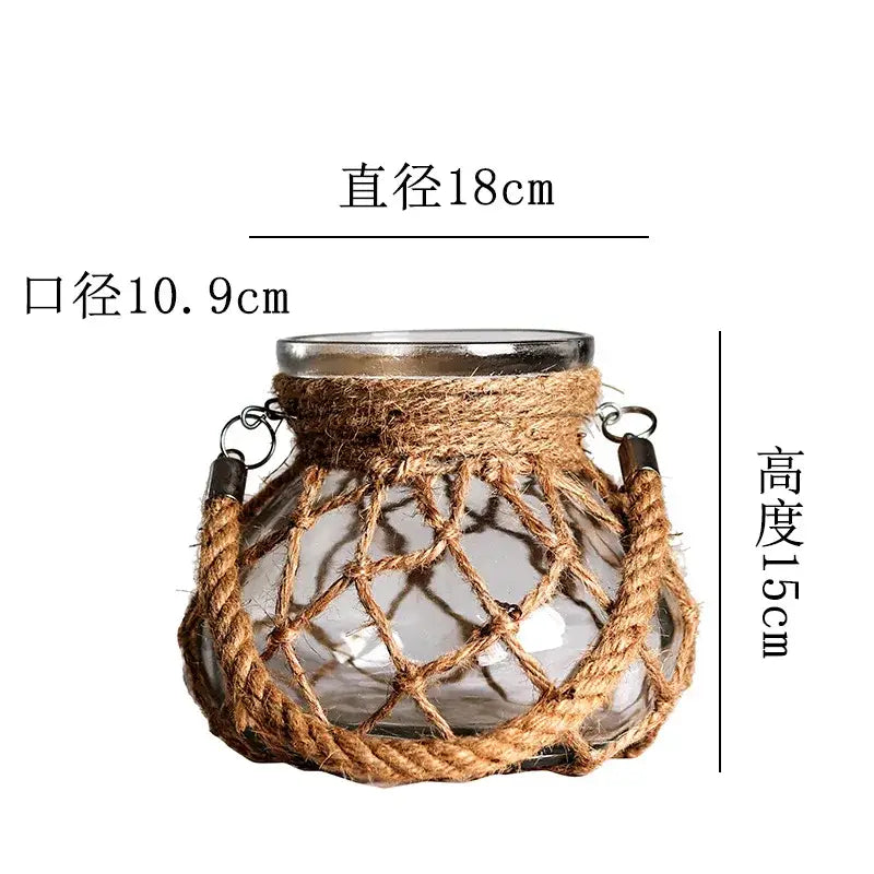 Rustic hanging glass vase with twine and metal handle β living room