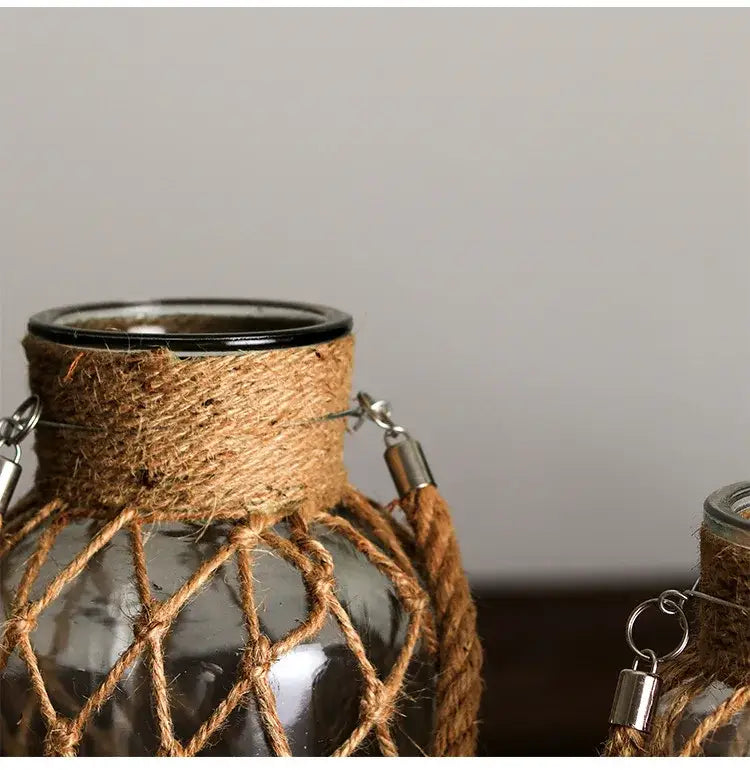 Rustic hanging glass vase with twine and metal handle β living room