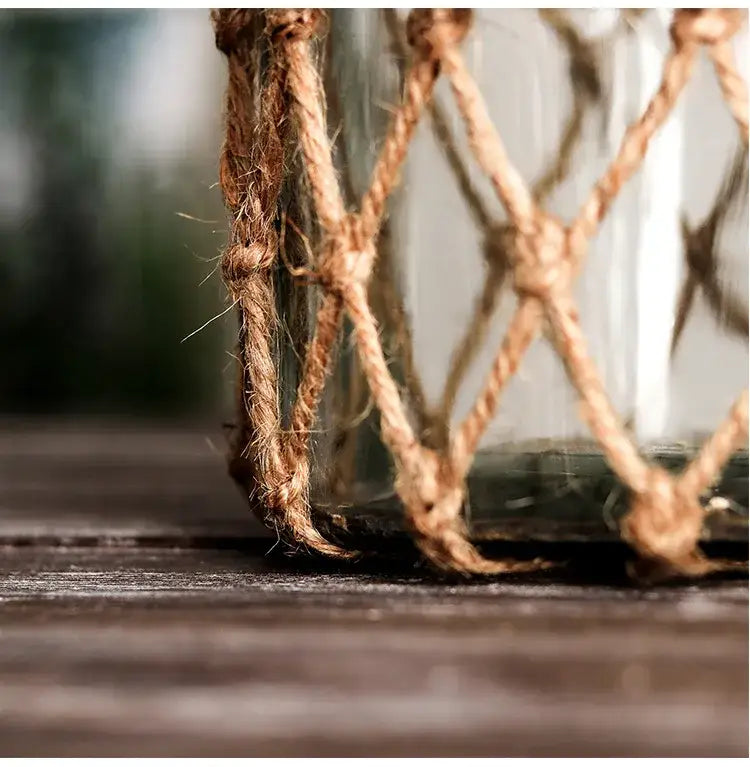 Rustic hanging glass vase with twine and metal handle β living room
