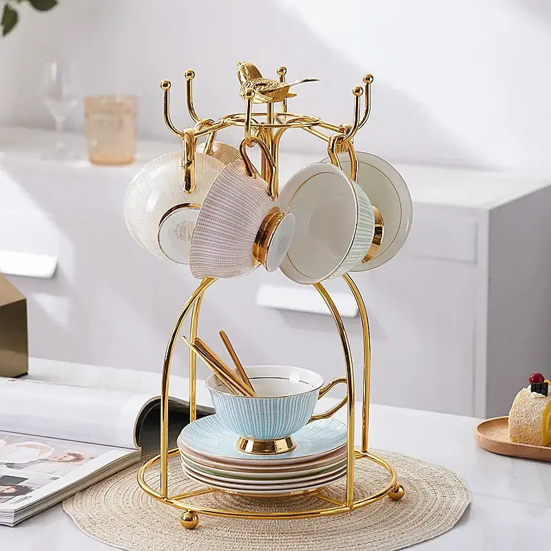 Elegant gold porcelain tea set dining room rack with bird figurine