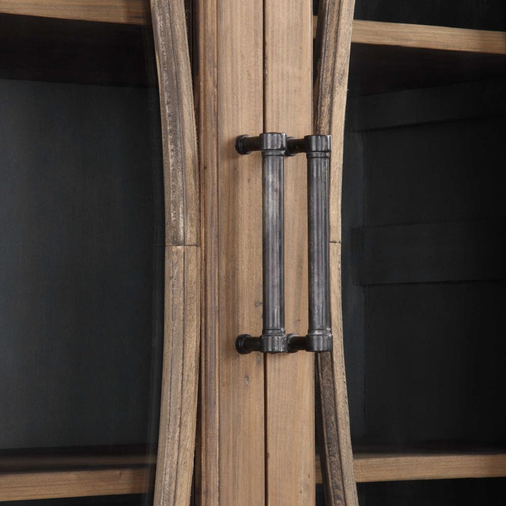 Close-up of glass doors and iron handles
