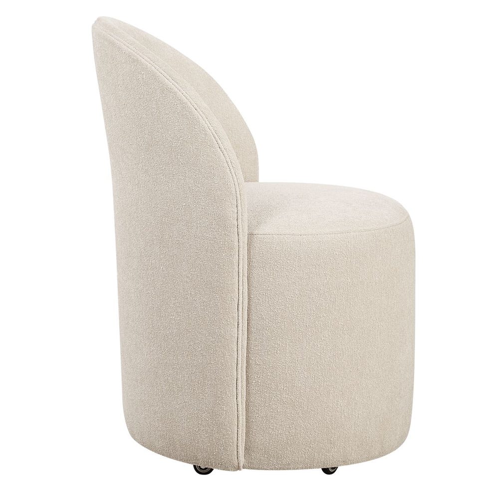 The Emery Upholstered Rolling Dining Chair