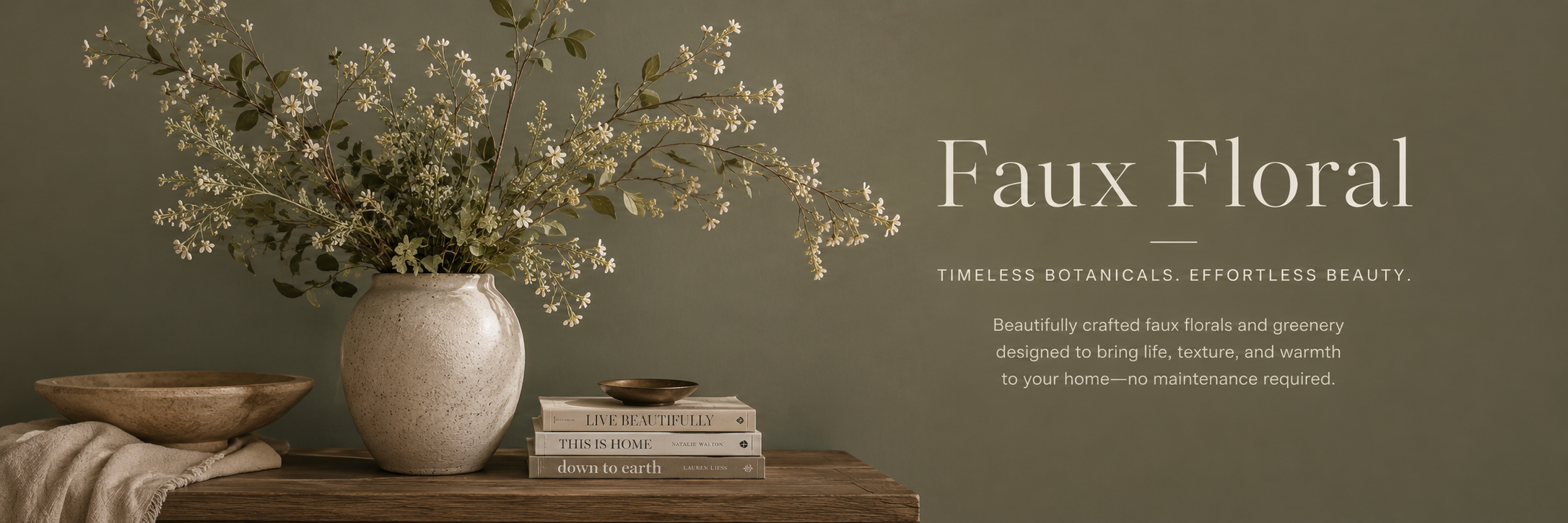 Neutral interior with faux floral arrangement in ceramic vase and warm natural lighting