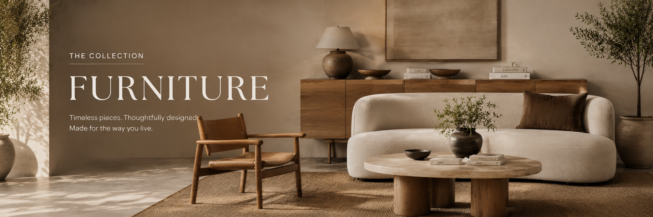 Refined neutral living space with timeless furniture pieces and soft natural textures