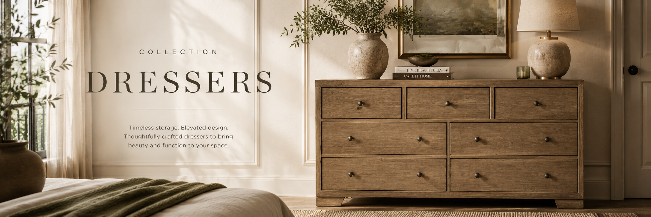 Warm neutral bedroom with wood dresser, soft textures, and natural green accents