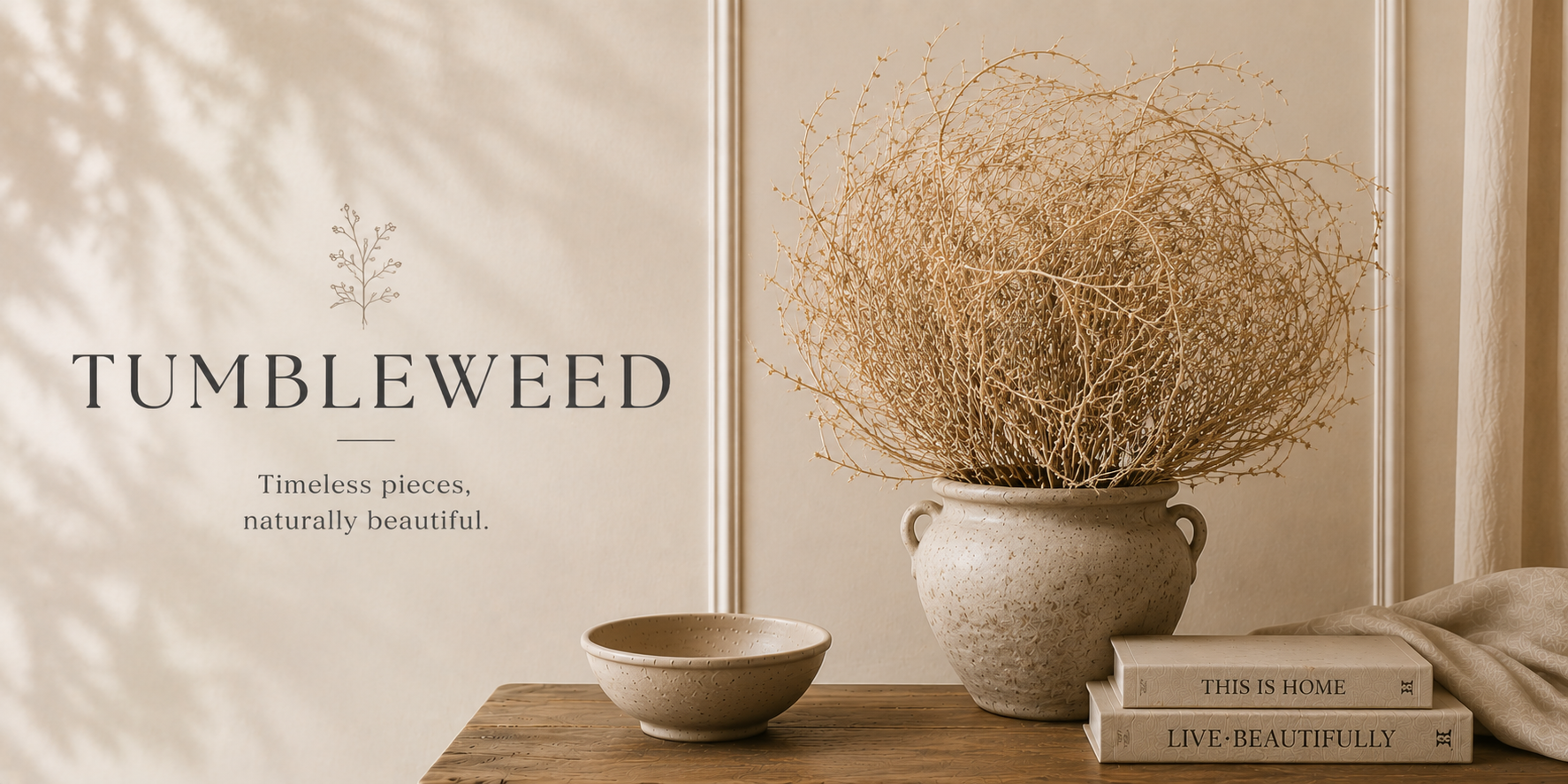 Natural tumbleweed styled in a ceramic vase on a wood surface with warm, neutral tones and organic textures