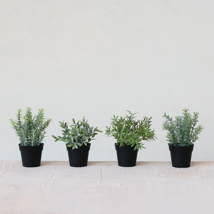 Faux herbs in plastic pots