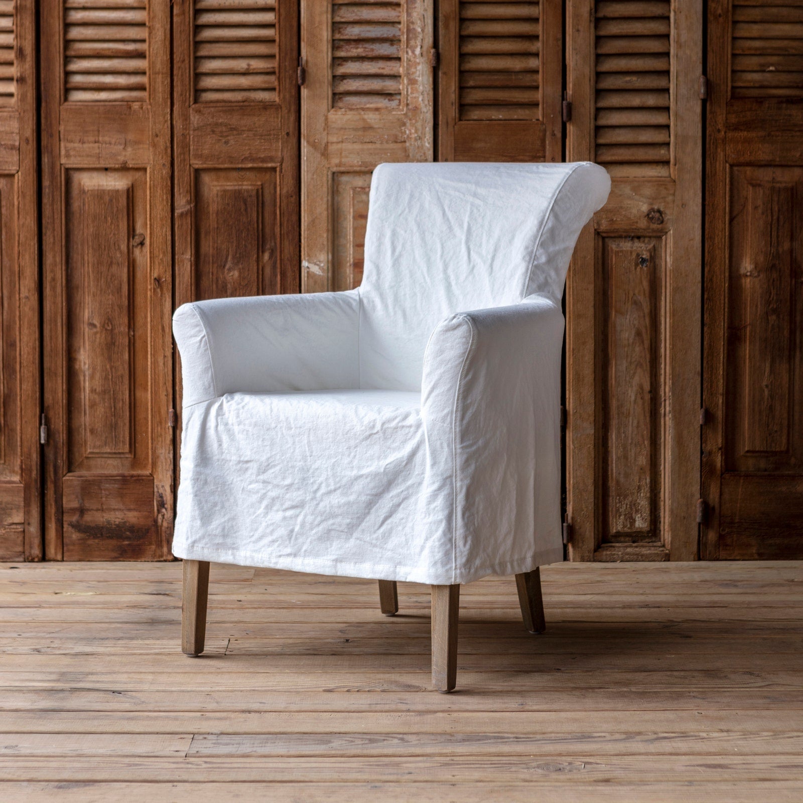 White Slipcovered Chair
