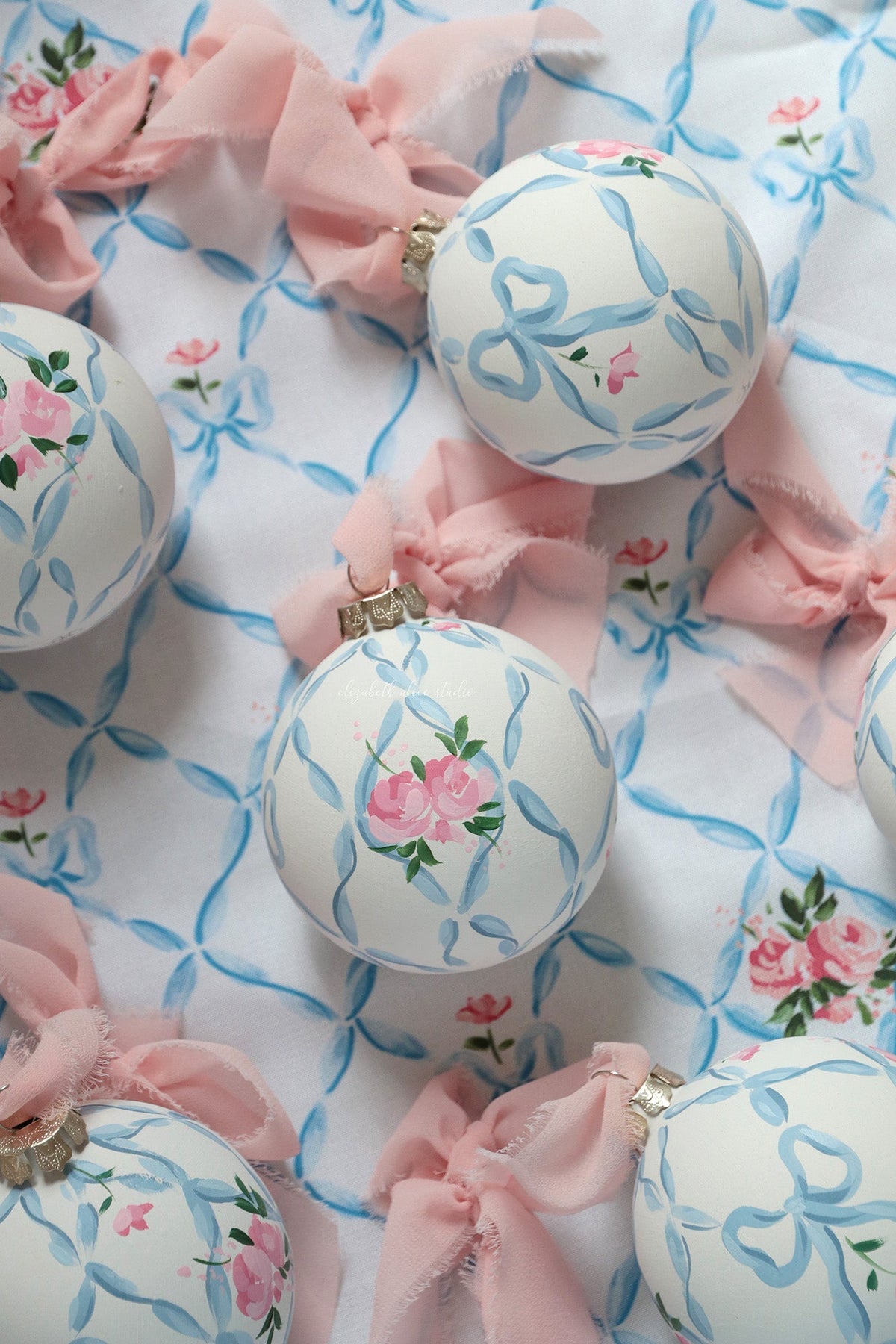 Ribbon trellis and rose hand-painted ornament