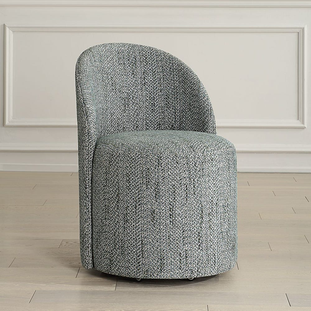 The Emery Upholstered Rolling Dining Chair