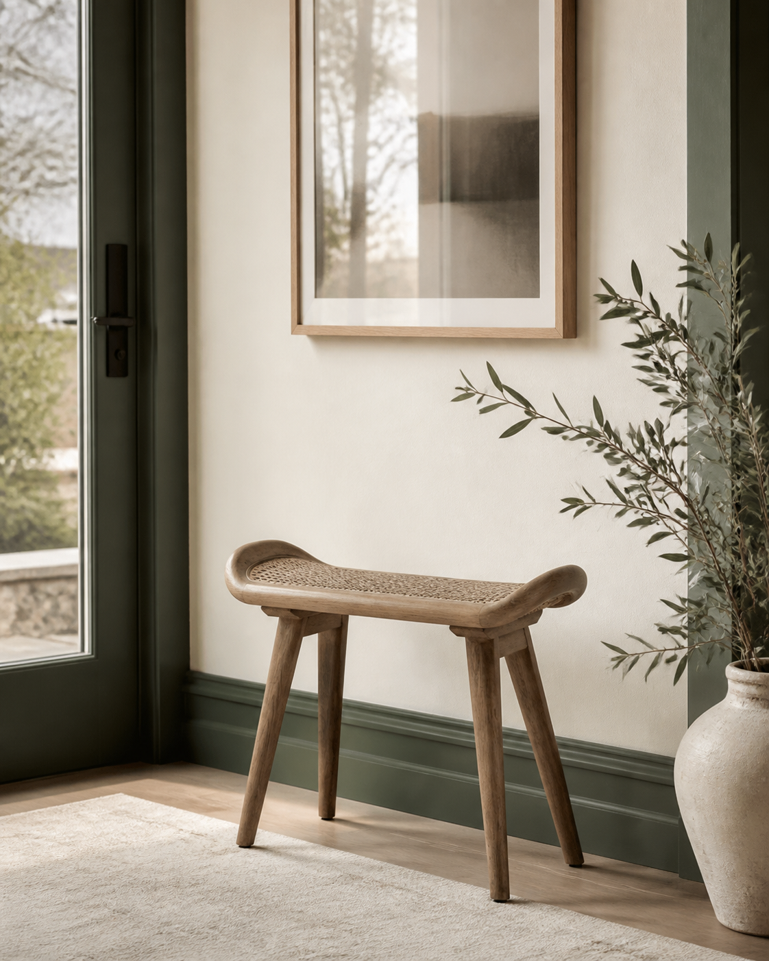 Arden Rattan Oak Bench styled in a refined cream and green entryway