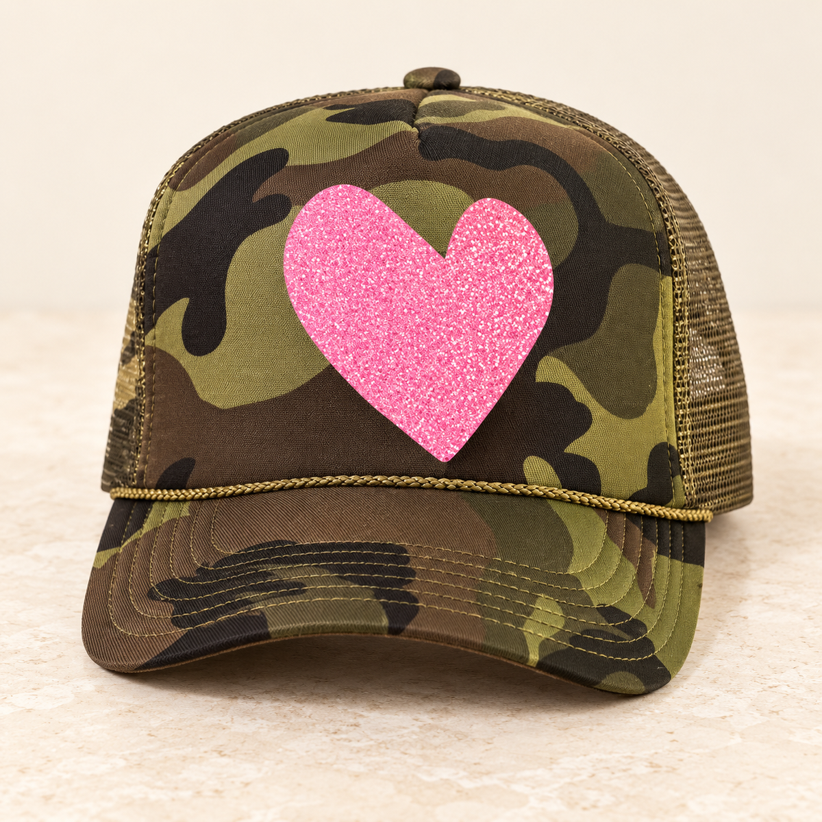 Artsy Heart - Camo Trucker — studio product photo