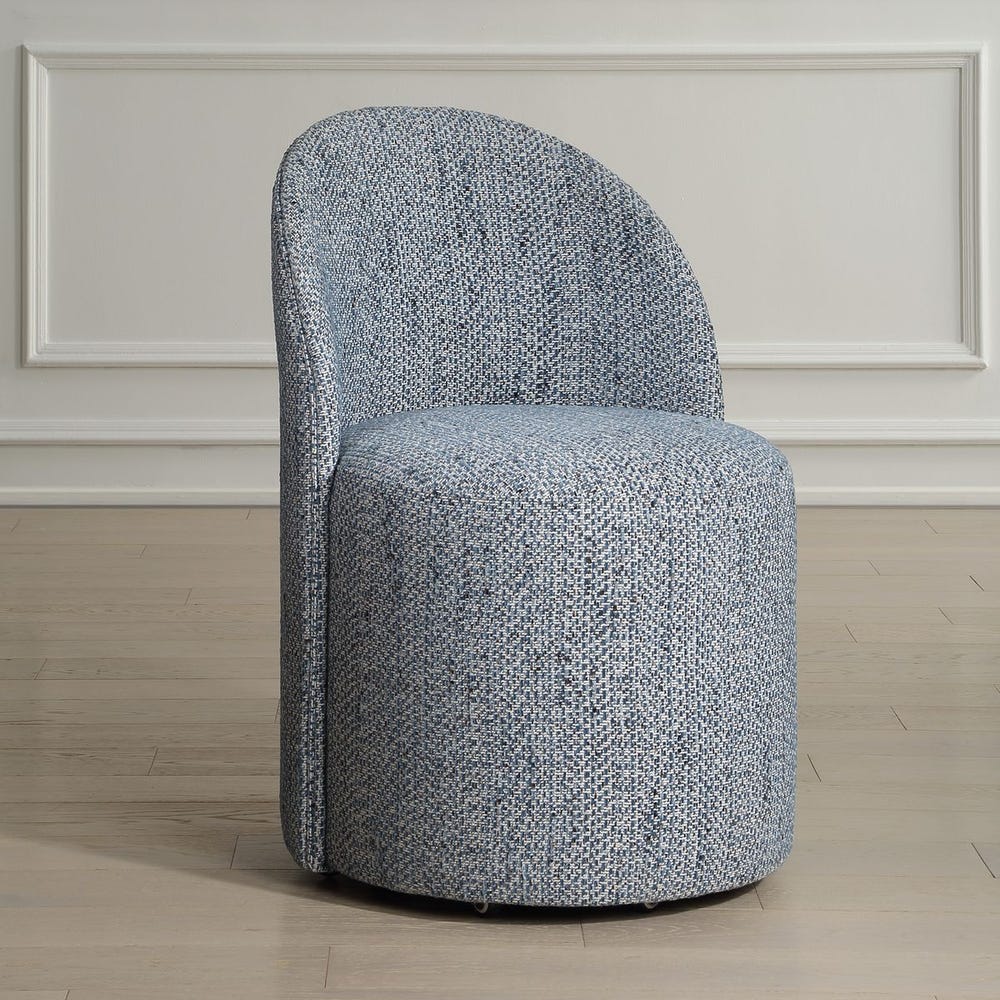 The Emery Upholstered Rolling Dining Chair