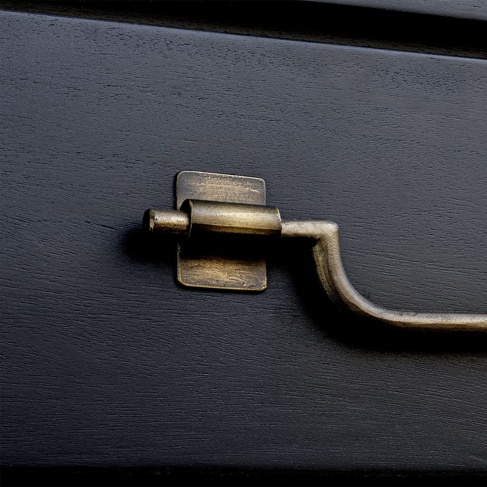 Close-up of brass drawer handle