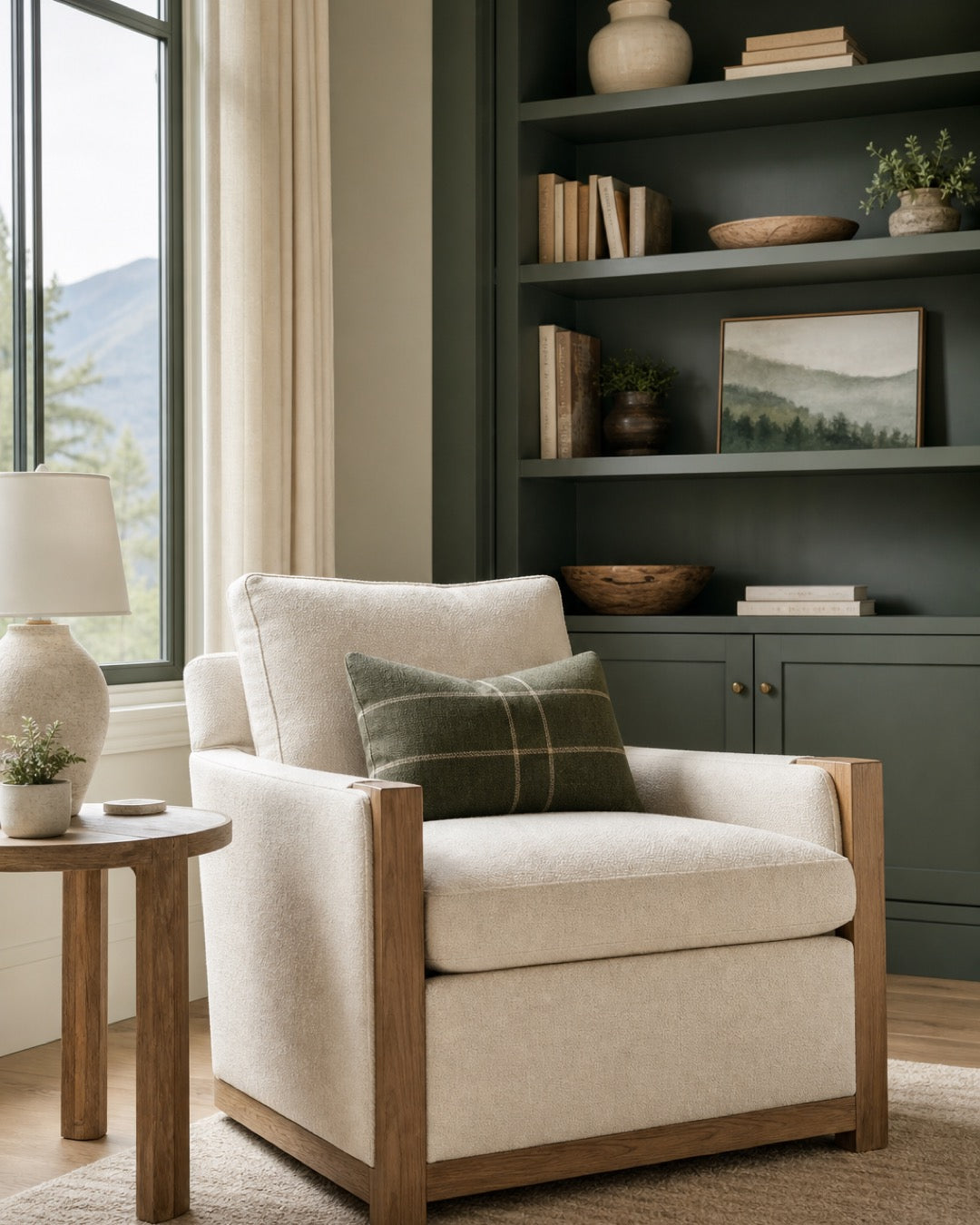 Refined cream accent chair in green and cream reading corner