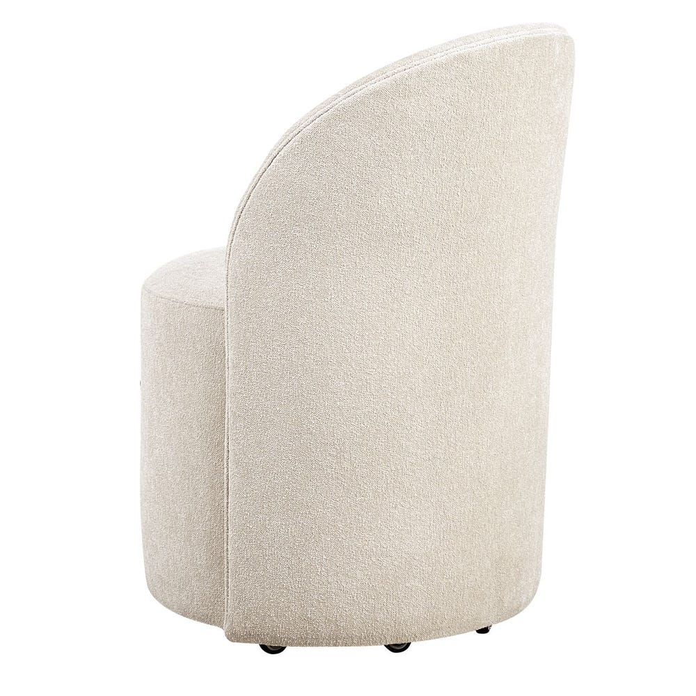 The Emery Upholstered Rolling Dining Chair