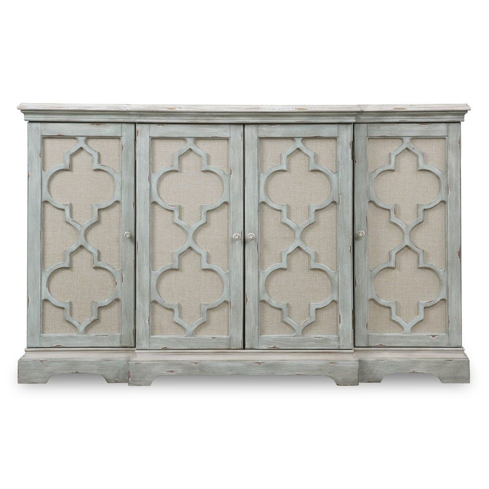 Front view of gray four-door cabinet with carved ivory accents