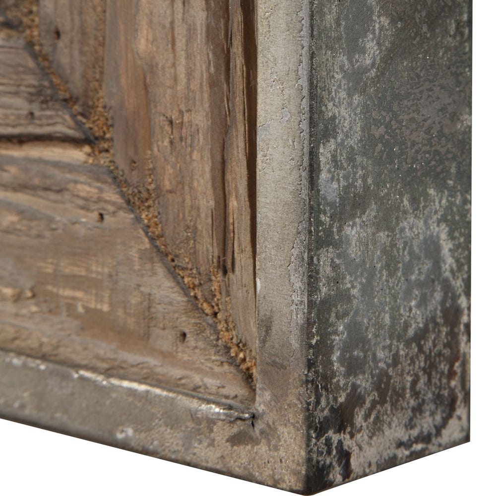 Close-up of weathered wood and silver metal frame detail